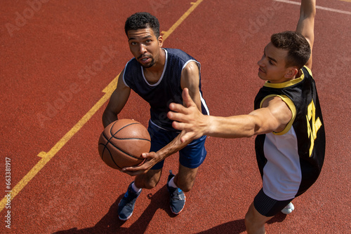 Basketball athlete men friends training on court.