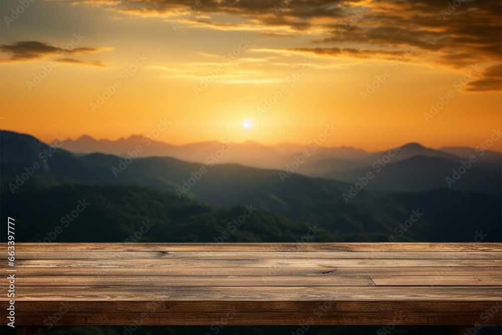Wooden table with a stunning sunset sky and mountain backdrop