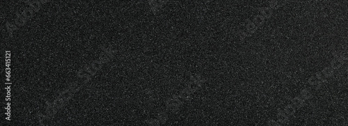 Background filled with black particles. 
