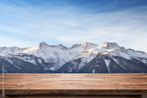 Empty wooden table and snow mountain, sunny