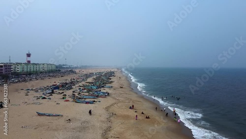  Aerial view of famous city in India, iconic Marina Beach and blue waters of Bay of Bengal - landscape panorama of South Asia from above Tamil nadu, India, chennai madras photo
