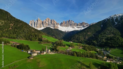 Spring landscape with shurch in Santa Magdalena village, Italian Dolomites Alps, in South Tyrol, Val di Funes, Italy, 4k photo