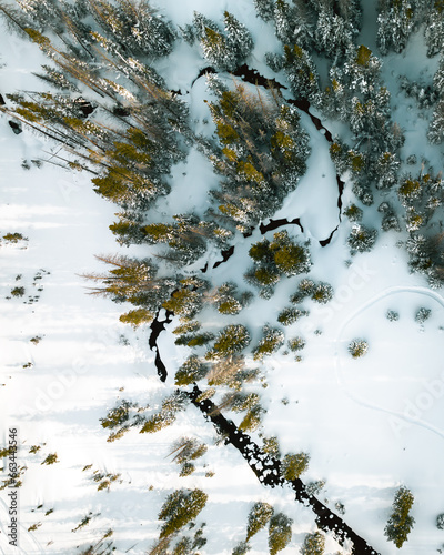 Curving Stream Aerial View in the Northern Colorado Rocky Mountains in Winter