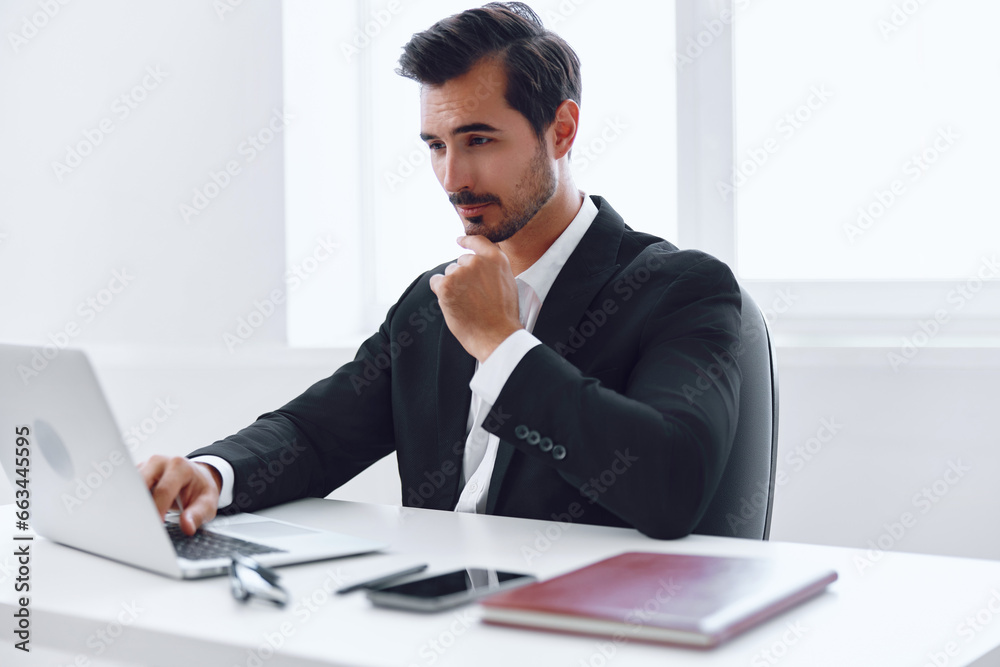 Man male tired sitting working computer business desk office thinking businessman laptop Man male tired sitting working computer business desk office thinking businessman laptop