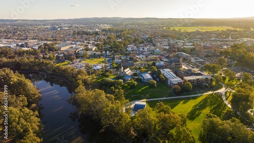 an aerial of a city and a lake with trees in the foreground, Wagga Wagga photo
