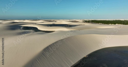 Aerial view of Parque Nacional dos Lencois Maranhenses, a protected coastal area of sand dunes and salt marsh with numerous ponds and lagoons, Barreirinhas, State of Maranhao, Brazil. photo