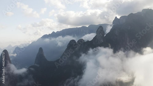 Aerial view of Serra dos Orgaos National Park with mountain landscape in low clouds, Teresopolis, State of Rio de Janeiro, Brazil. photo