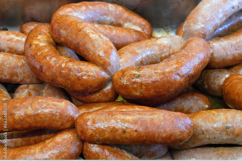 Close-up pictures of Nduja sausage roasted in the oven. Close-up pictures of Nduja sausage roasted in the oven.