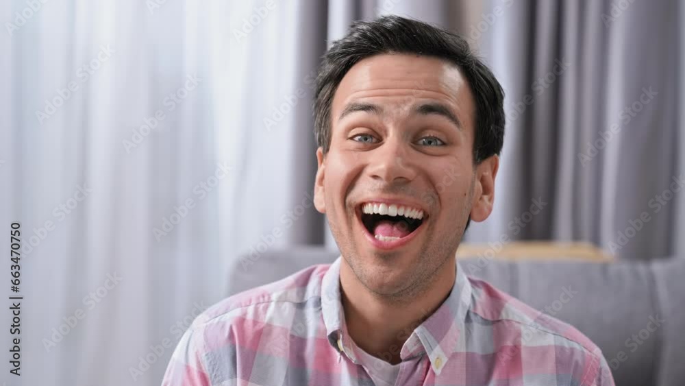 Silly burst out laugh. Happy 30s person head shot. Young adult man look