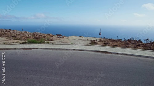 Aerial view of beautiful high cliffs along the coastline facing the Mediterranean Sea, Dingli, Malta. photo