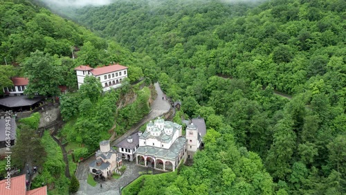 Macedonian Landmark. Orthodox church and monastery of St. Joachim of Osogovo (Joakim Osogovski) near Kriva Palanka on a foggy day. Drone footage in 4k.