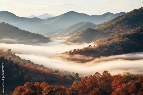 Fog rolling in over mountain valleys during autumn foliage