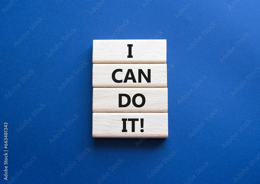 I can do it symbol. Concept words I can do it on wooden blocks. Beautiful deep blue background. Business and I can do it concept. Copy space. I can do it symbol. Concept words I can do it on wooden blocks. Beautiful deep blue background. Business and I can do it concept. Copy space.