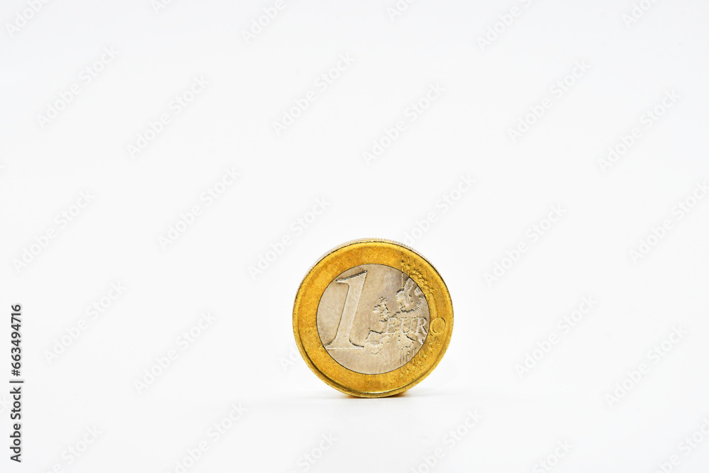 One Euro coin isolated on a plain white background. Copy space. One Euro coin isolated on a plain white background. Copy space.