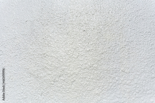 white background wall in bumpy paint photo