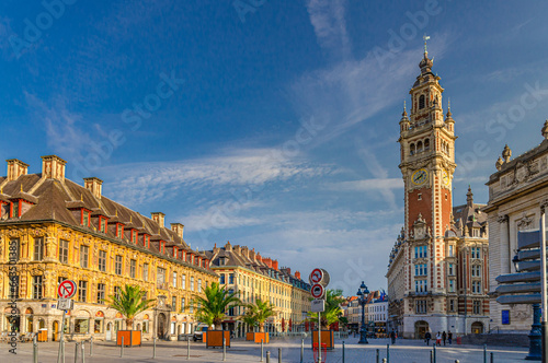 Lille cityscape with Place du Theatre square in historical city center, Vieille Bourse Old Stock Exchange flemish mannerist style building and Chamber of Commerce Nouvelle Bourse, Northern France photo