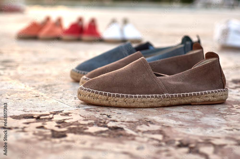 Naklejka premium Spanish espadrilles in the Dominican Republic of different colors ready to be sold
