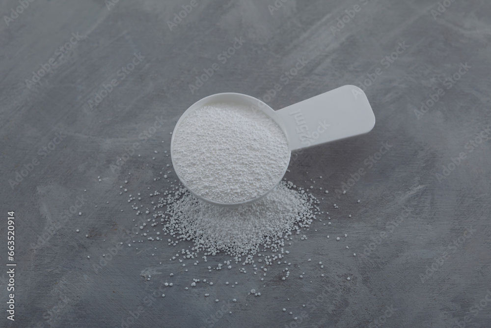 Sodium percarbonate or sodium carbonate peroxide in measuring spoon ...