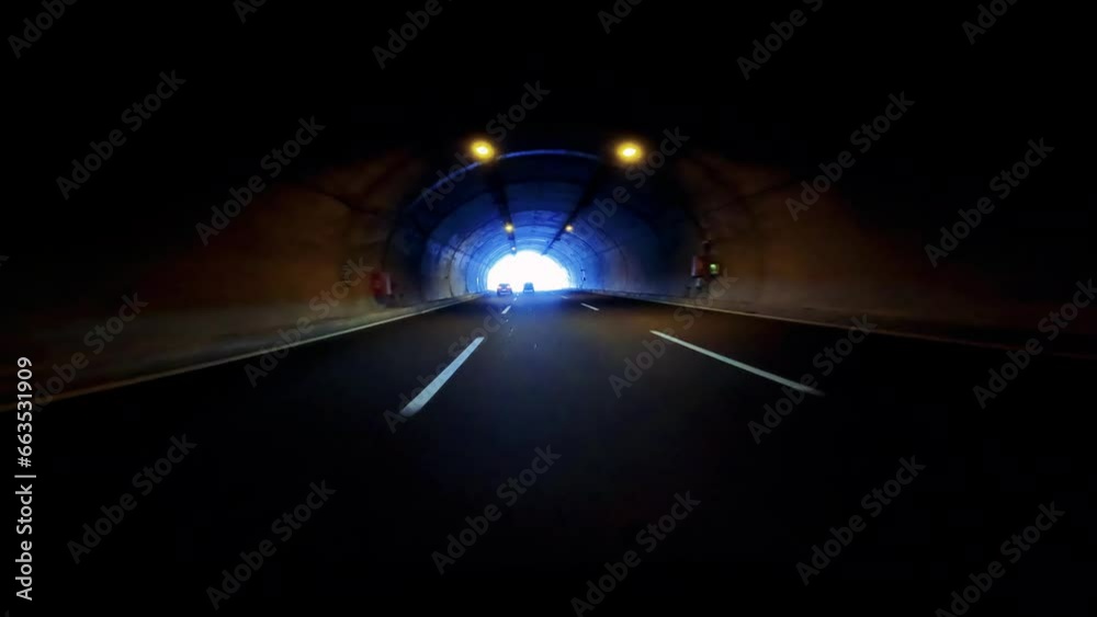 Car perspective exiting light tunnel. 4K Car perspective exiting light tunnel. 4K