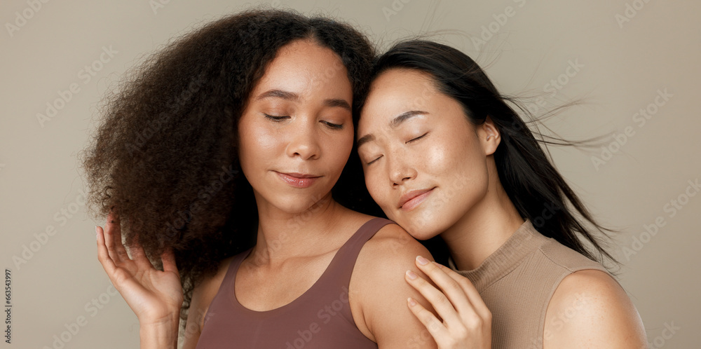 Beauty, hair and portrait of women friends in studio for diversity, inclusion and wellness. Face of model people on beige background for different facial care, makeup glow or cosmetics and wind