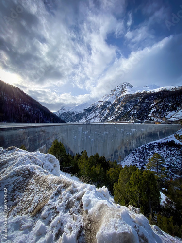 Panoramic view of Punt dal Gall arch dam  near Livigno in winter