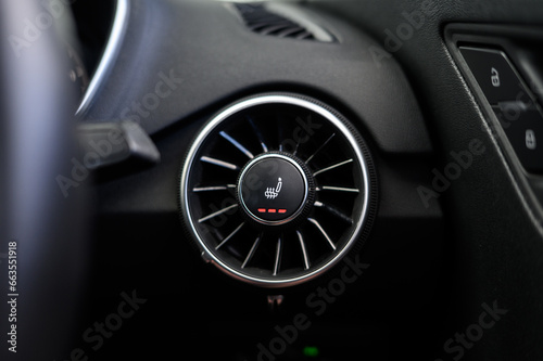 Heated seats button in sports car