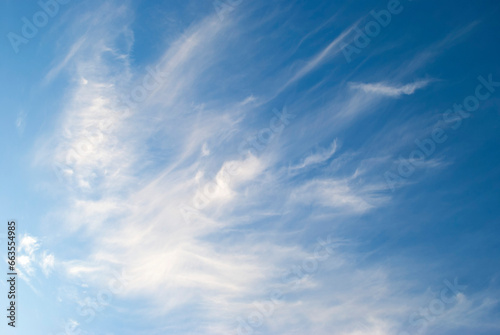 cirrus clouds in the blue sky photo