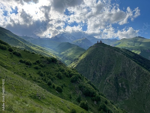 fantasy castle monastery in the green mountains of Georgia