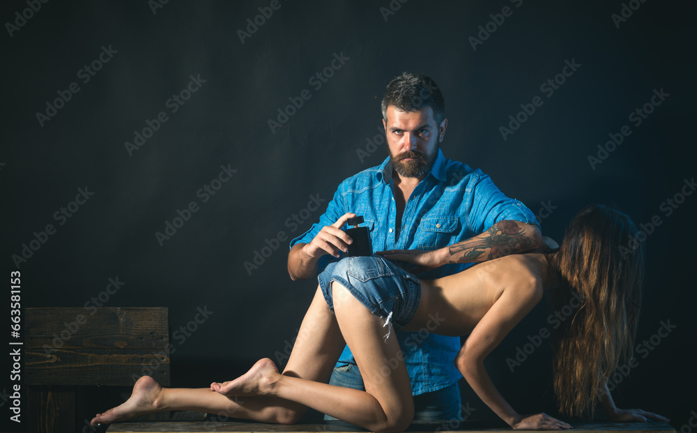 Sexy couple in love. Sensual boyfriend embraces lovers. The concept of tenderness and affection. Sexy couple in love. Sensual boyfriend embraces lovers. The concept of tenderness and affection.