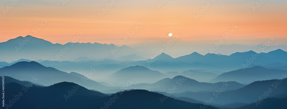 A breathtaking mountain range illuminated by the setting sun