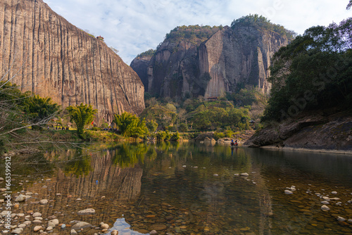 The river and the strange shaped rocks background around Wuyishan, China