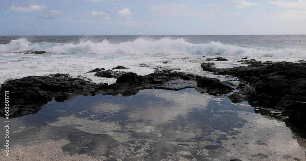 Pacific ocean surf tide pool south point Kona Hawaii. Southern most