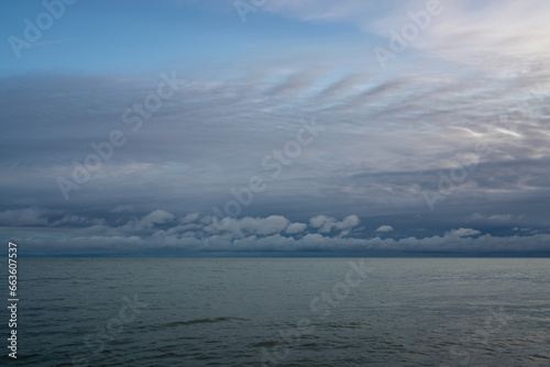 View of the Black Sea on the coast of Sochi against the sunset sky, Sochi, Krasnodar Krai, Russia © Ula Ulachka