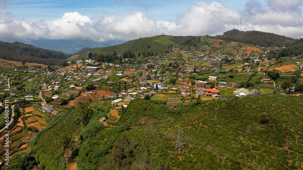 Aerial view of Houses and buildings on the slopes of the mountains in the town of Nuwara Eliya. Sri Lanka. Aerial view of Houses and buildings on the slopes of the mountains in the town of Nuwara Eliya. Sri Lanka.