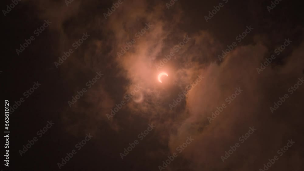 solar eclipse 2023 , cinematic 24 fps with variable ND filter. Moon crossing the sun eclipse. solar eclipse 2023 , cinematic 24 fps with variable ND filter. Moon crossing the sun eclipse.