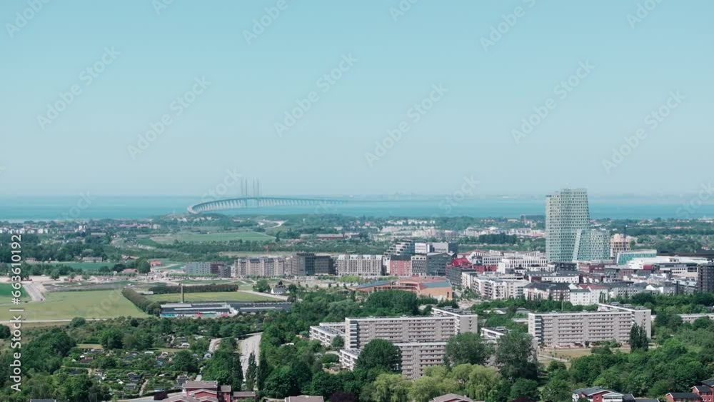 Telephoto sideways aerial over Swedish city Malmö and Oresund bridge, copyspace Telephoto sideways aerial over Swedish city Malmö and Oresund bridge, copyspace