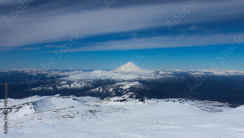 Panoramic view of the Andes Mountains in southern Chilo, seen from the top of the Villarrica volcano. photo