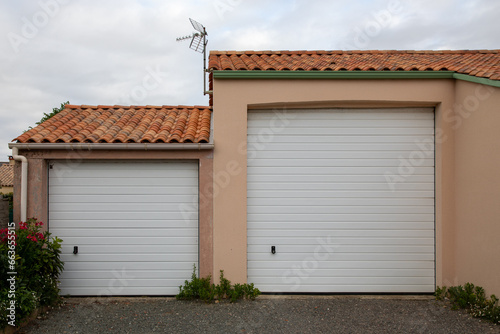 Tela facade high and classic new modern double two garage white on home door of resid