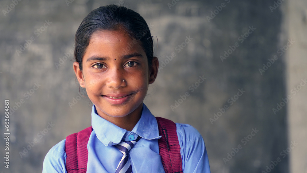 Portrait of happy indian teenager school boy with backpack holding books. Smiling young asian male kid looking at camera. Portrait of happy indian teenager school boy with backpack holding books. Smiling young asian male kid looking at camera.