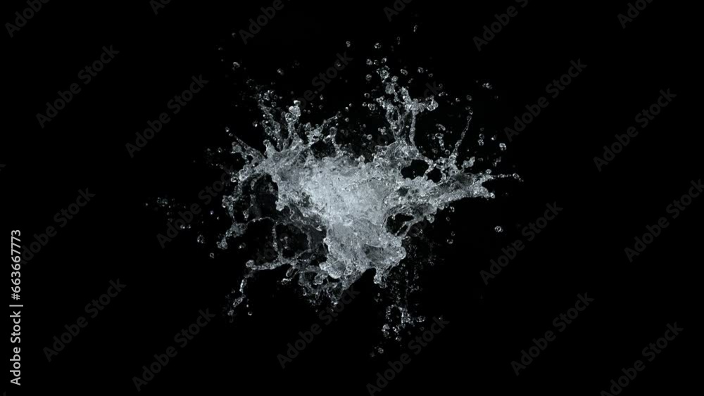 Super Slow Motion Shot of Real Water Splash Explosion from Surface Isolated on Black at 1000fps. Super Slow Motion Shot of Real Water Splash Explosion from Surface Isolated on Black at 1000fps.