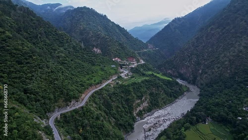 Drone view of picturesque highland landscape and harsil valley with bhagirathi river photo