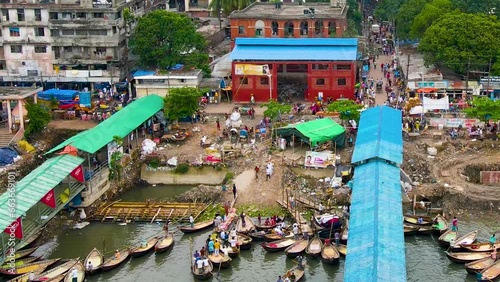 Buriganga River Port Terminal With Wooden Ferries In Sadarghat, Dhaka, Bangladesh. Aerial Shot photo