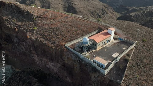 aerial view in orbit over the Temisas astronomical observatory and the mountain where it is, in the municipality of Aguimes. Gran Canaria. photo