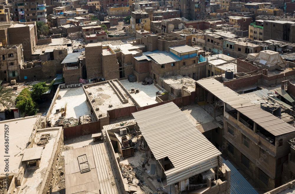 Flat roofs in Islamic Cairo close up aerial view, Egypt dense building urban background