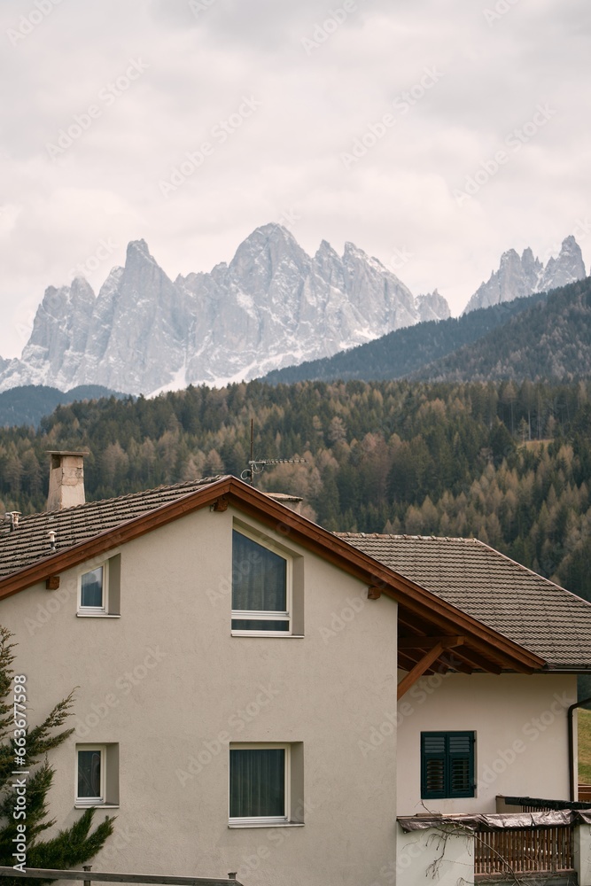 Old house in the European Alps. Dolomites mountains.