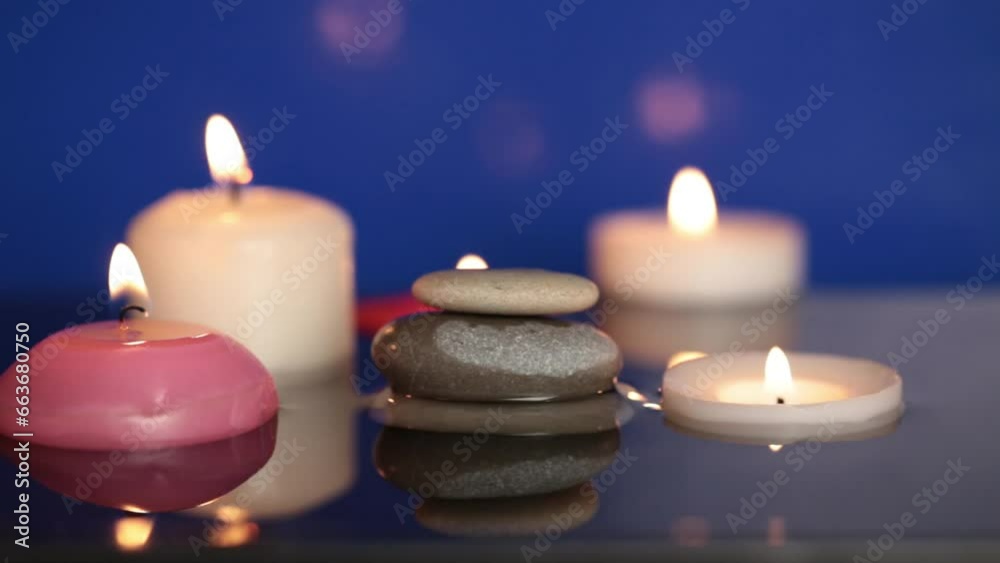 Zen garden with the burning candles Zen garden with the burning candles