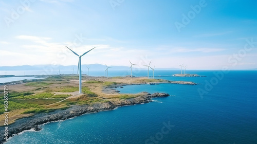 An aerial view of a windmill park located in the ocean, surrounded by clear waters.
