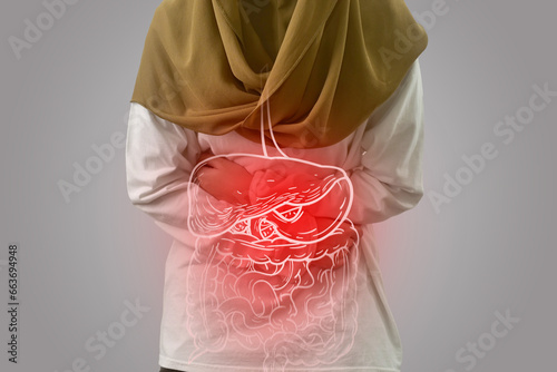 Digital composition of internal digestive system with highlighted red inflammation on sick person, woman with stomach pain, health and medical
