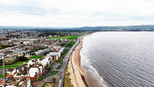 Aerial view of beautiful homes situated on the stunning coastline of Ayr, Scotland photo