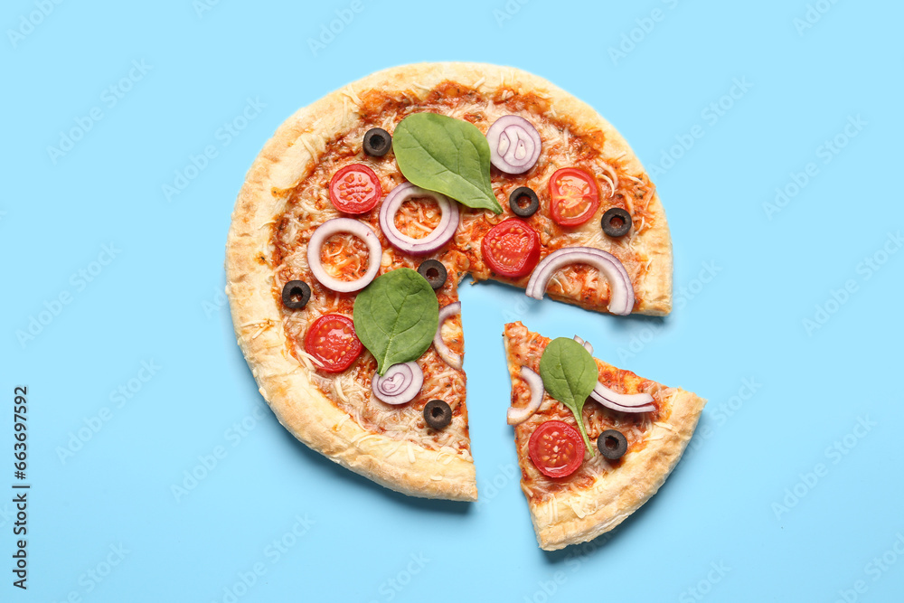 Tasty pizza with basil and tomatoes on blue background Tasty pizza with basil and tomatoes on blue background